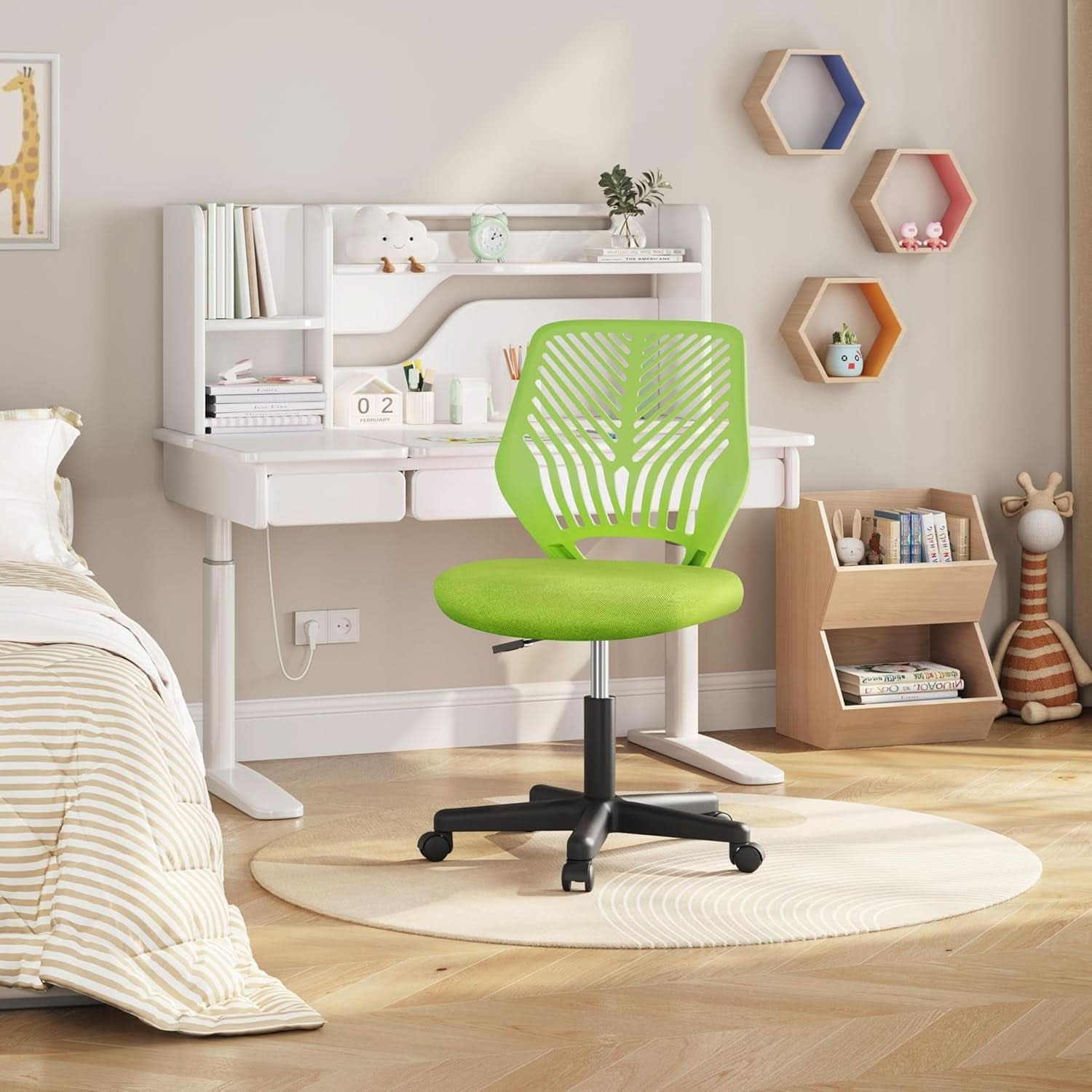 Kids green swivel desk chair with armless design, padded seat, and ergonomic lumbar backrest. — view 2