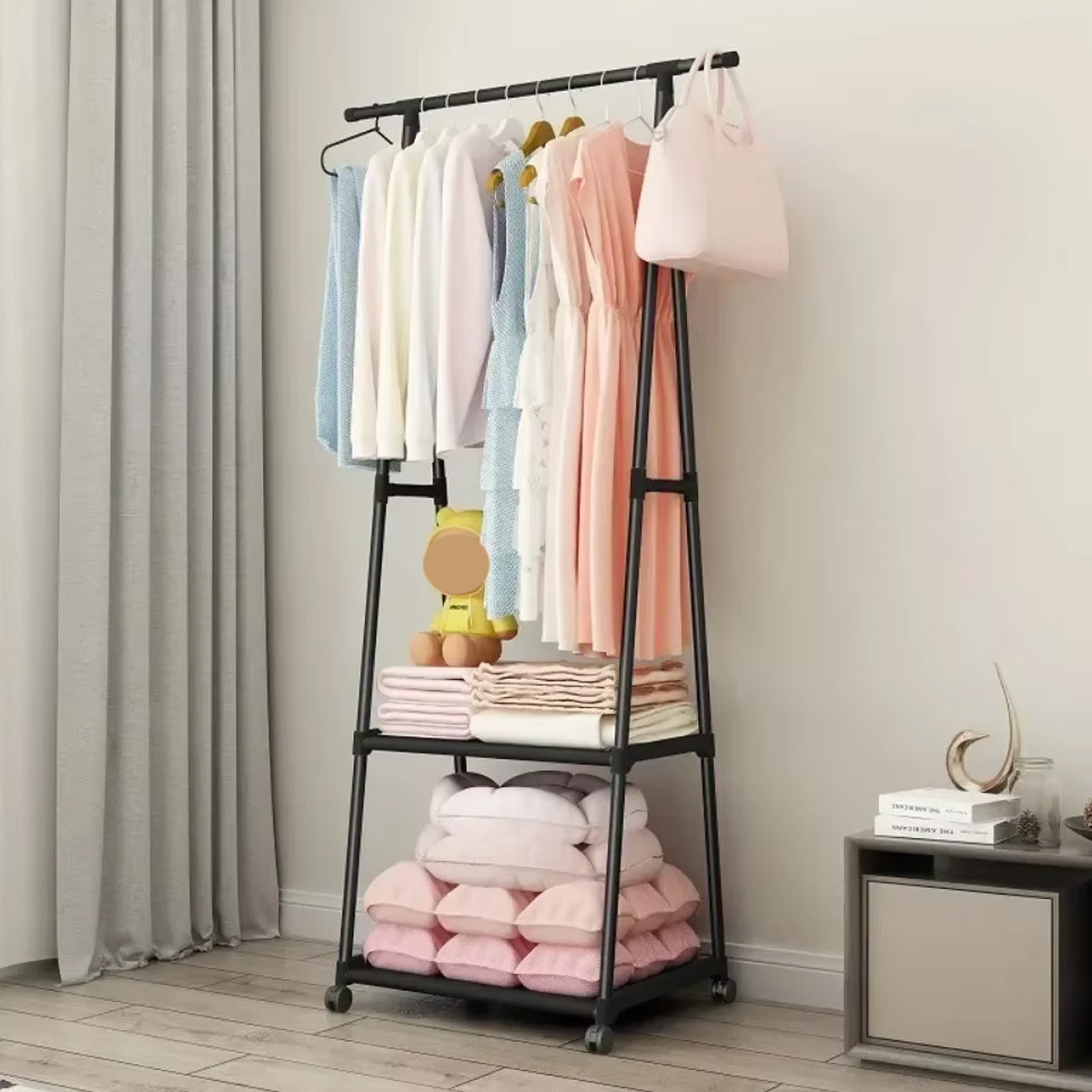 Triangle metal coat rack with hanging rod and bottom shelves in black and white finish — view 5