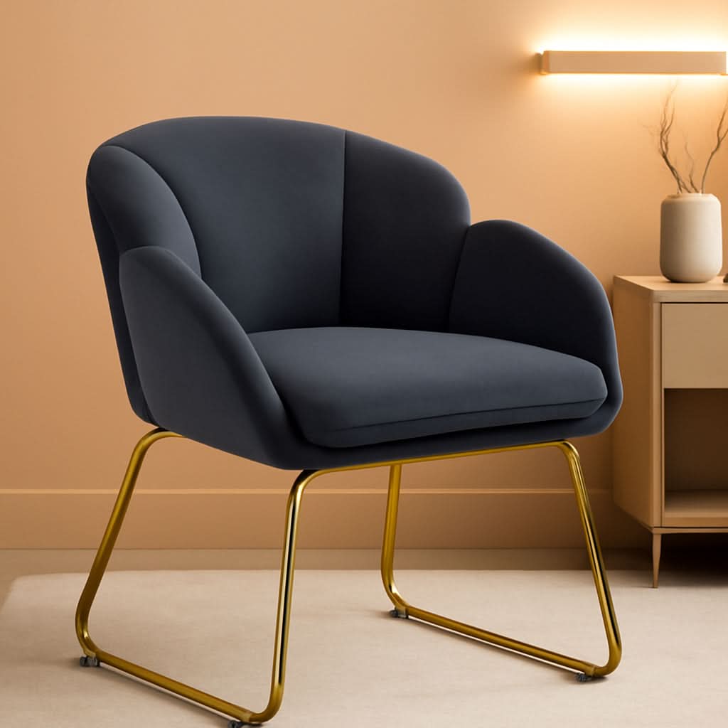Dark gray flower shaped velvet armchair featuring golden metal legs and blooming petal backrest