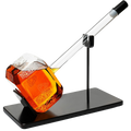 Clear hand-blown borosilicate glass Thor's hammer whiskey decanter for serving premium spirits at home.