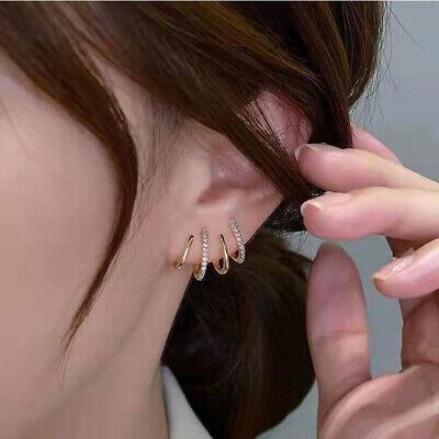 Spiral hoop earrings with a polished gold finish, lightweight and hypoallergenic design — view 5