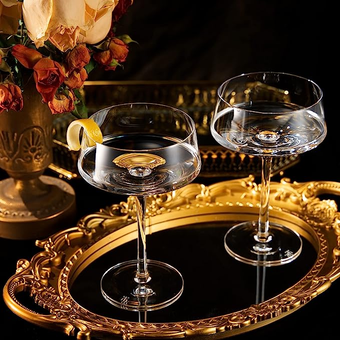 Two luxury clear glass 10oz martini coupes with an elegant silver mixing spoon for home bars — view 2