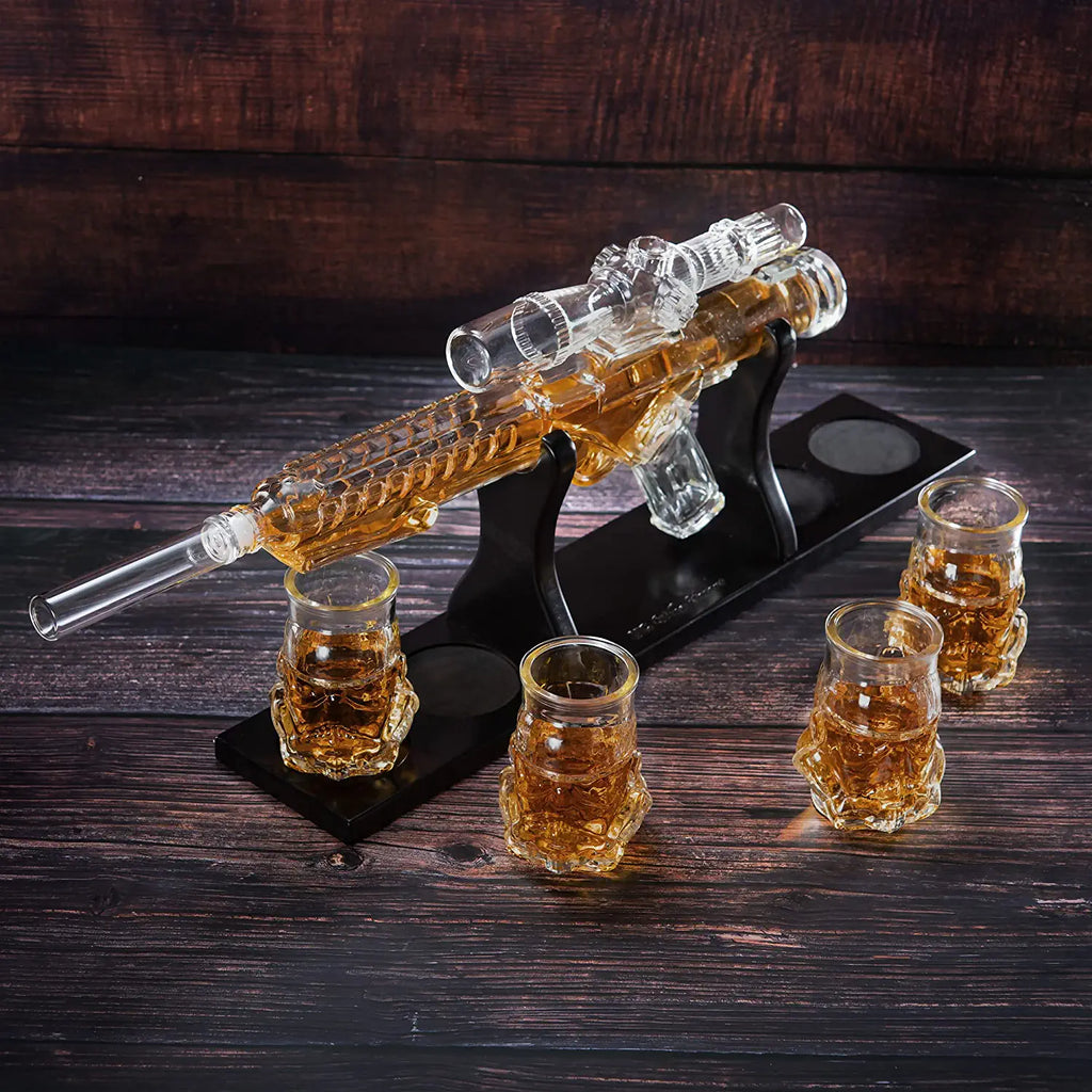 Glass blaster force gun whiskey decanter set with four glasses on a mahogany wood display base — view 2