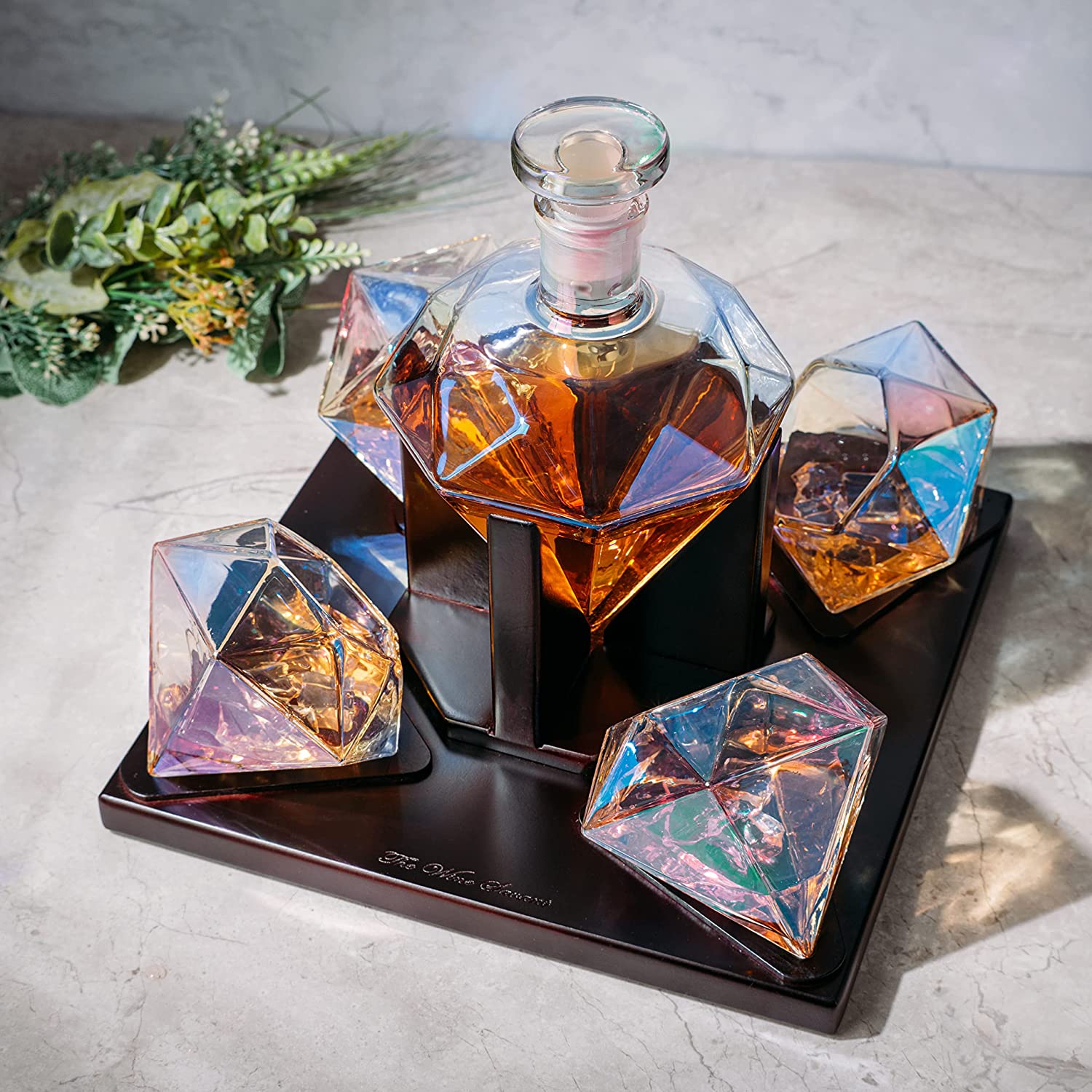 Diamond iridescent whiskey decanter set with two glasses on a mahogany wood stand — view 3