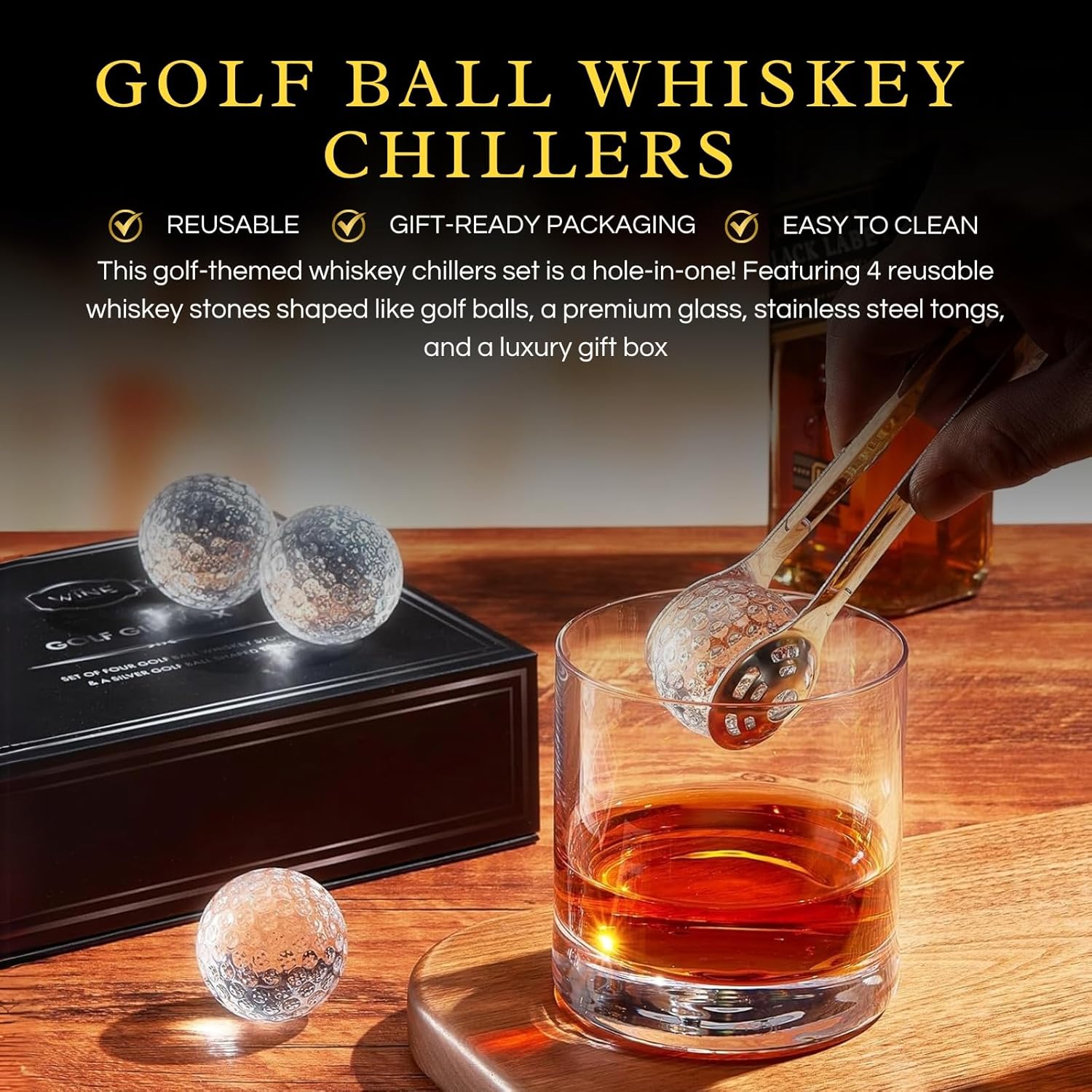 Four glass golf ball whiskey chillers with stainless steel tongs inside a premium cotton lined box — view 5