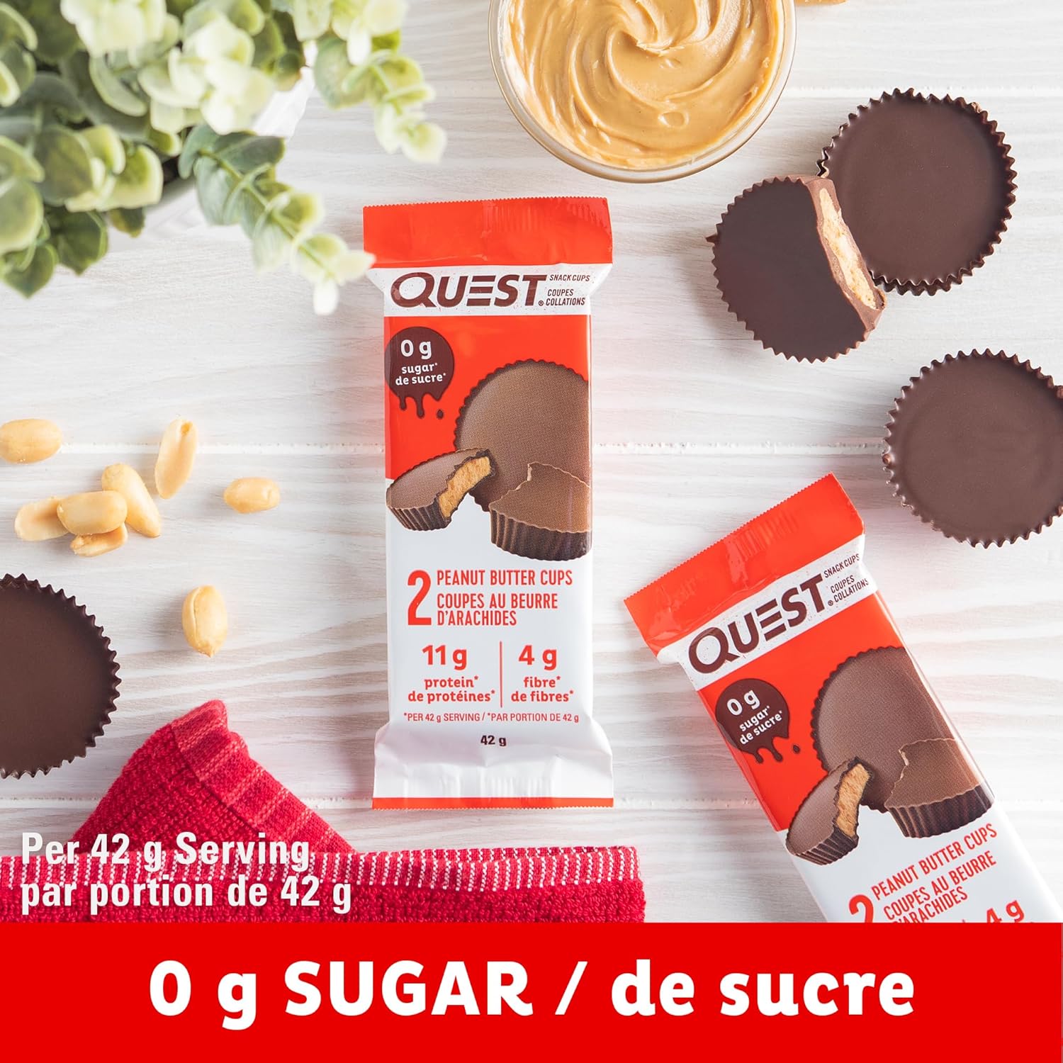 Box of twelve Quest peanut butter cups featuring high protein and low sugar nutritional labels. — view 5