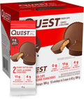 Box of twelve Quest peanut butter cups featuring high protein and low sugar nutritional labels.