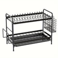 Black metal kitchen dish rack with integrated drainboard, utensil holder, and cutting board organizer