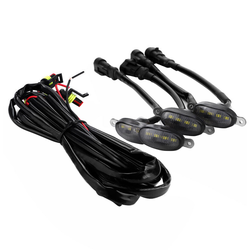 Four piece smoked lens white LED truck grille running lights with included wiring harness setup — view 2