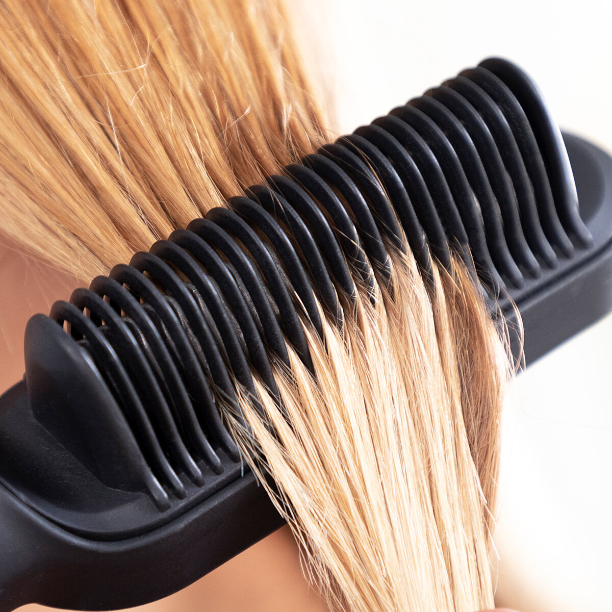 Black and fuchsia ceramic hair straightening brush with adjustable temperature controls and anti burn design — view 11
