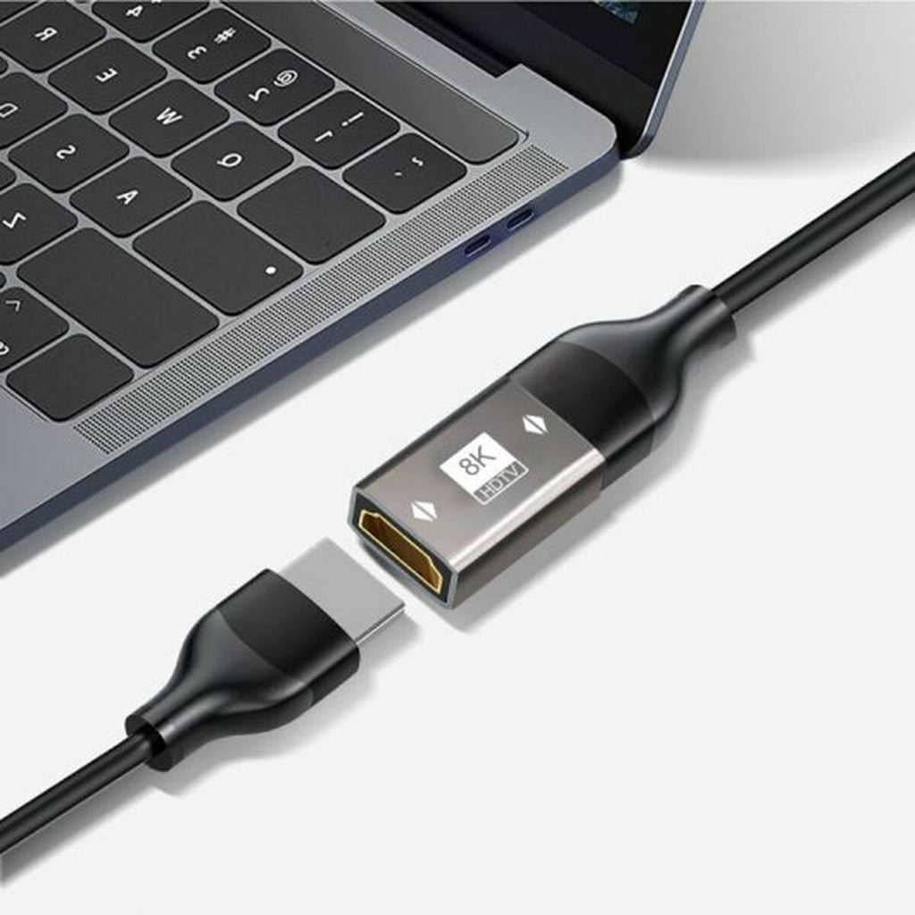 Black high-speed HDMI 2.1 wired adapter for computers and gaming consoles on a clean background. — view 3