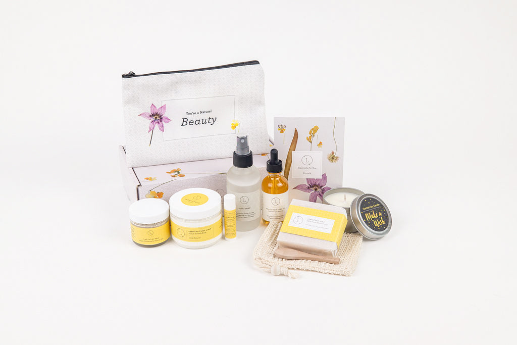 Natural citrus bath and body spa gift box featuring grapefruit scrub, body oil, and soap bar