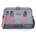 Dark gray quilted diaper bag with vegan leather straps and spacious double zipper opening
