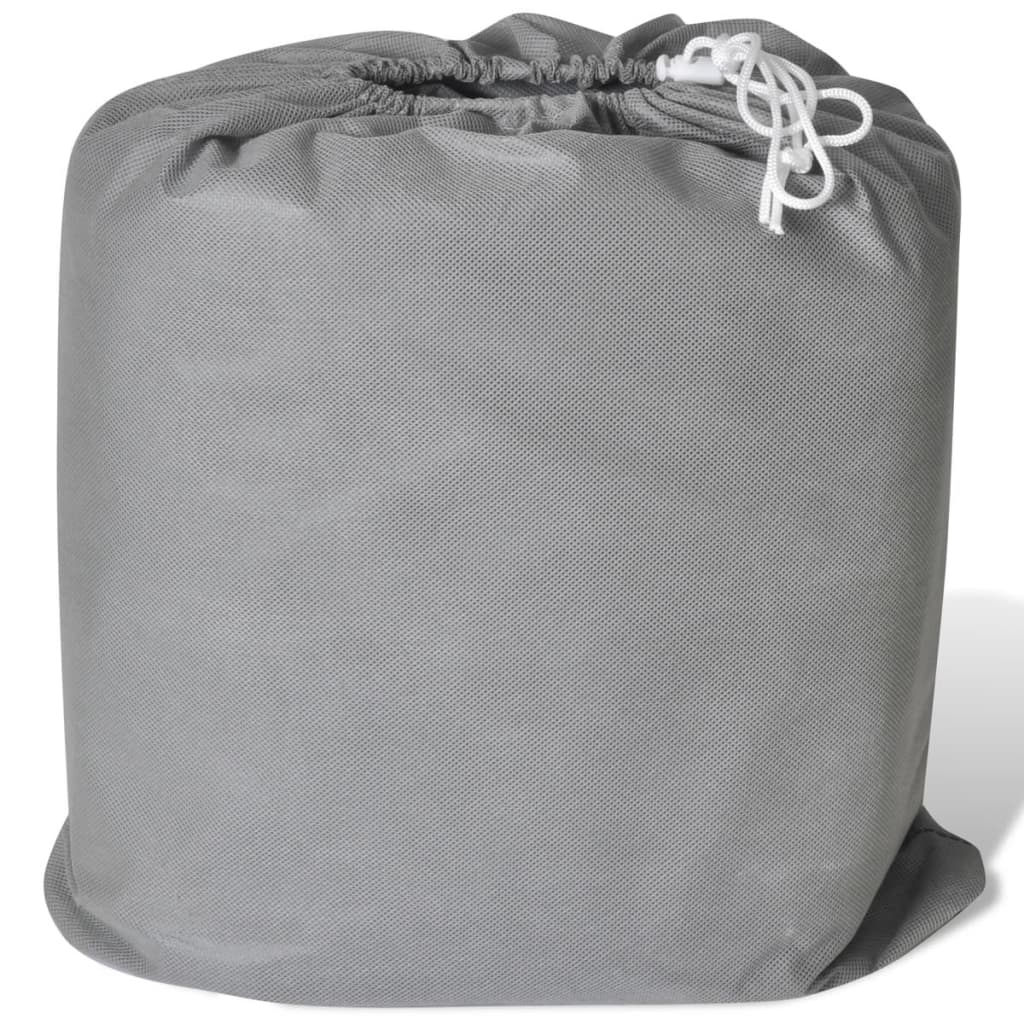 Medium grey nonwoven car cover securely fitted over a sedan for outdoor weather protection — view 5