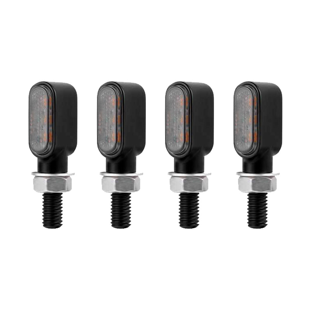 Four amber mini LED motorcycle turn signal indicators for custom 12V bikes.