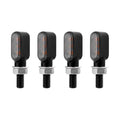 Four amber mini LED motorcycle turn signal indicators for custom 12V bikes.