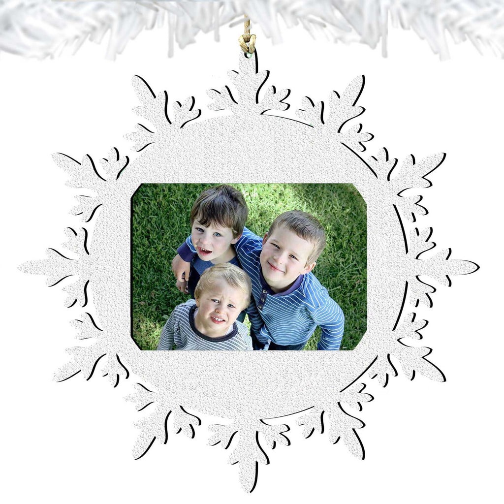 Wooden snowflake Christmas photo ornament featuring a central picture frame for festive tree decorations — view 4
