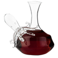 Clear blown glass octopus whiskey decanter with detailed tentacles and integrated pouring spout