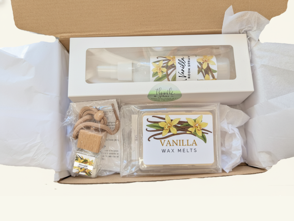 Vanilla comfort gift box with room spray, wax melts, and car diffuser in elegant packaging