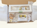 Vanilla comfort gift box with room spray, wax melts, and car diffuser in elegant packaging