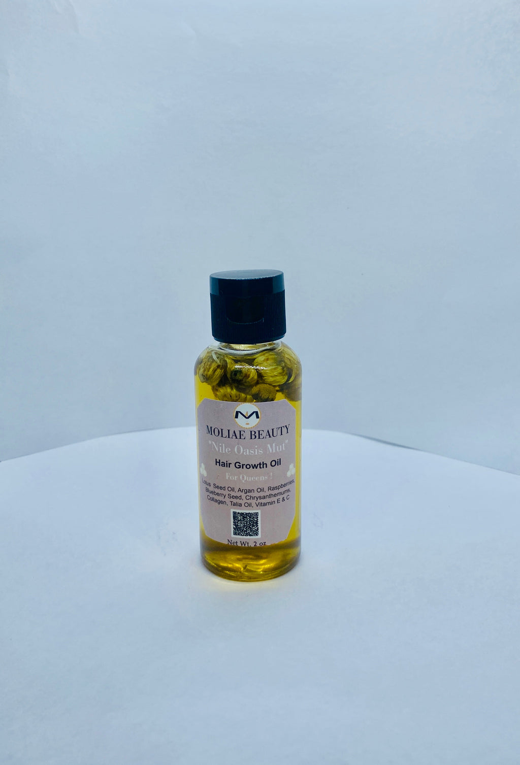 MOLIAE Beauty starter kit box featuring hair growth oil bottle and cucumber hydrating body spray — view 4