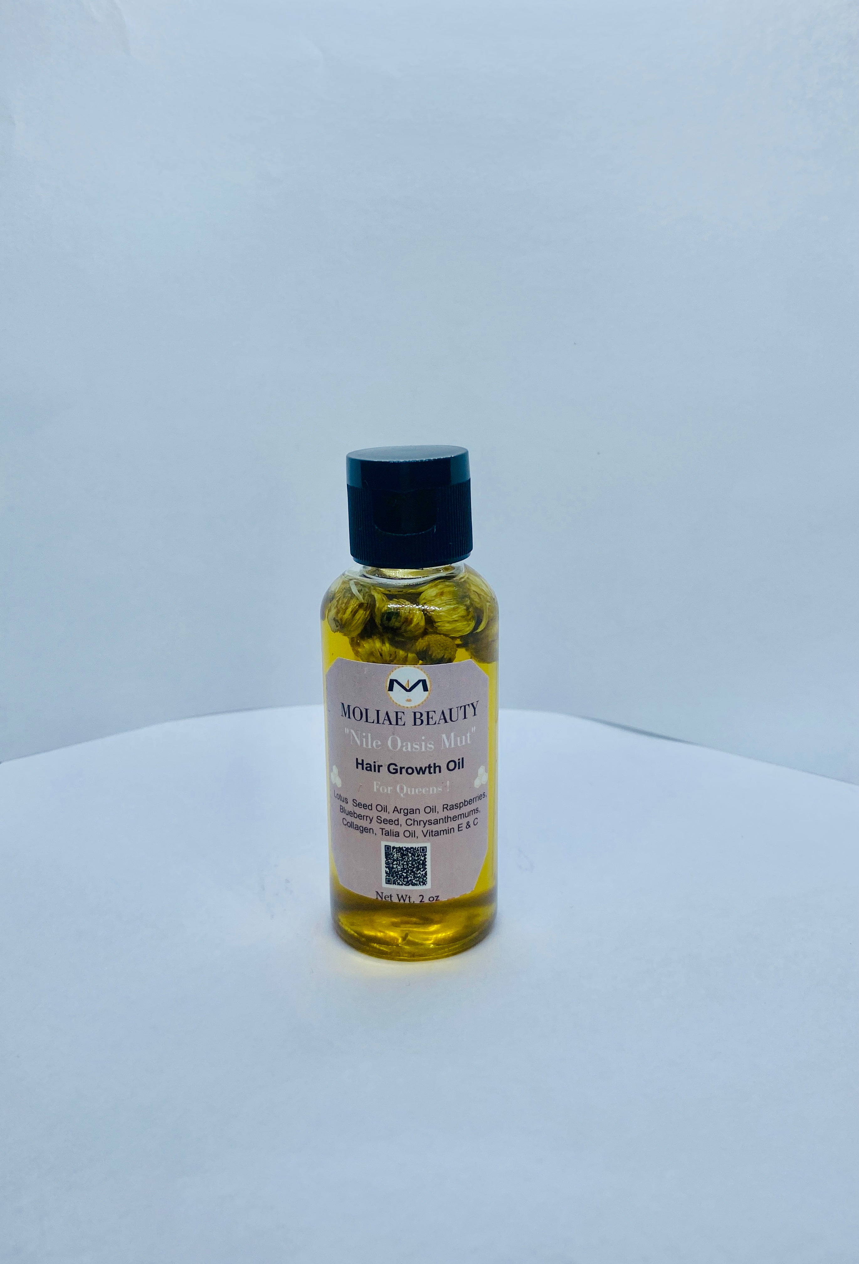 MOLIAE Beauty starter kit box featuring hair growth oil bottle and cucumber hydrating body spray — view 4