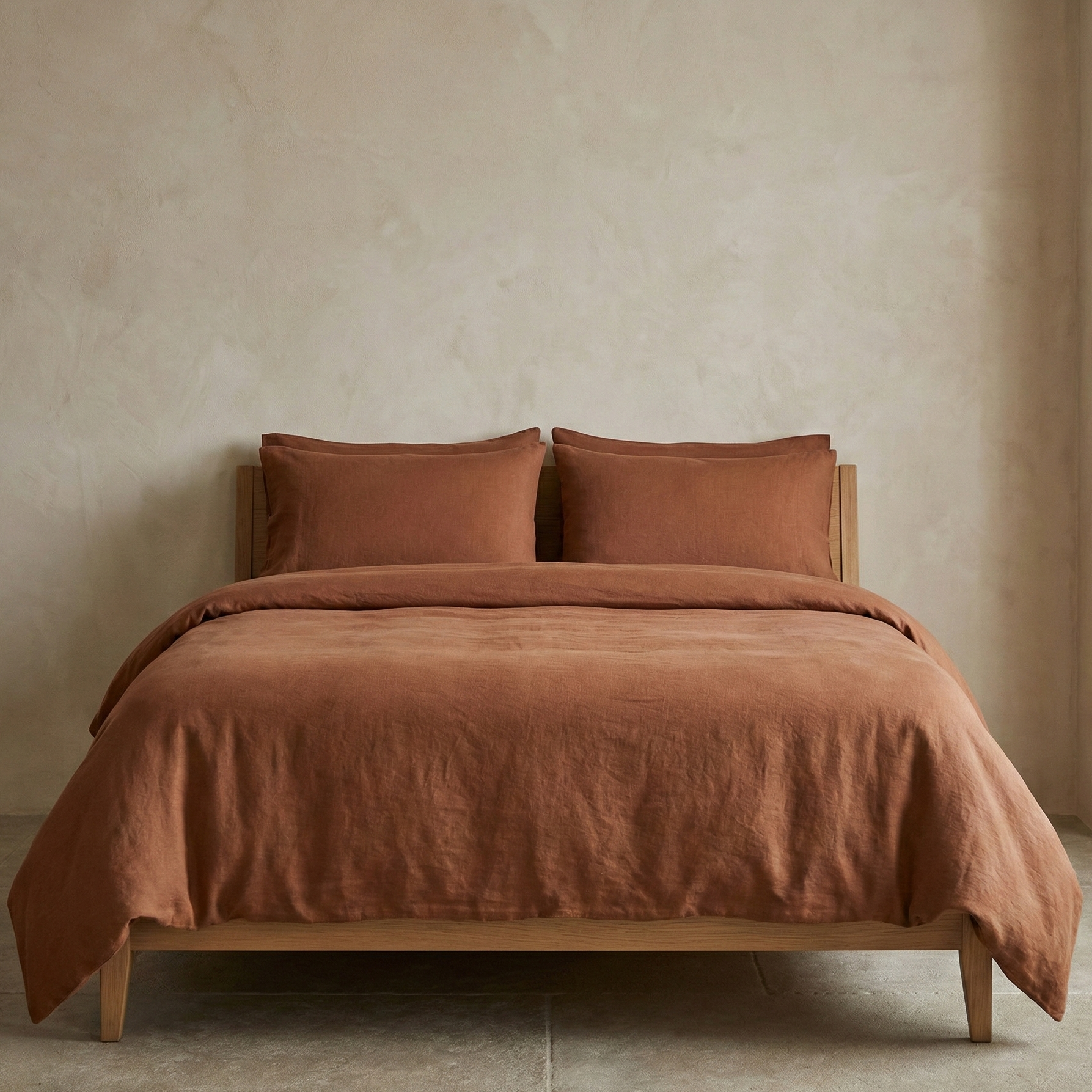 Linen cotton duvet cover set in berry purple with matching pillow shams and subtle texture