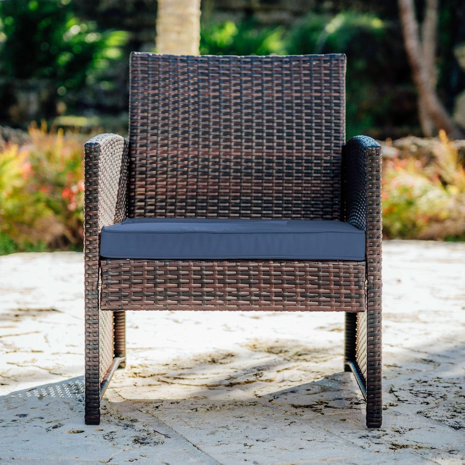 Brown 3-piece wicker outdoor patio bistro set with navy cushions and a square side table. — view 3