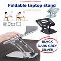 Adjustable aluminum laptop stand in silver, folded and displaying ergonomic design with silicone padding.