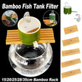 Bamboo external aquarium filter box attached to a small glass fish tank for clear water