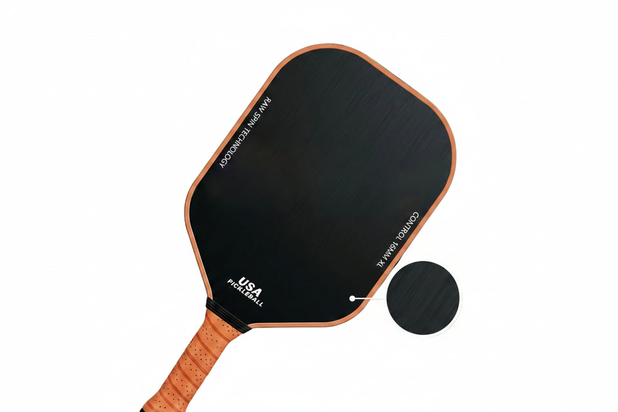 NNETM T700 carbon fiber pickleball paddle with black textured face and ergonomic anti-slip grip