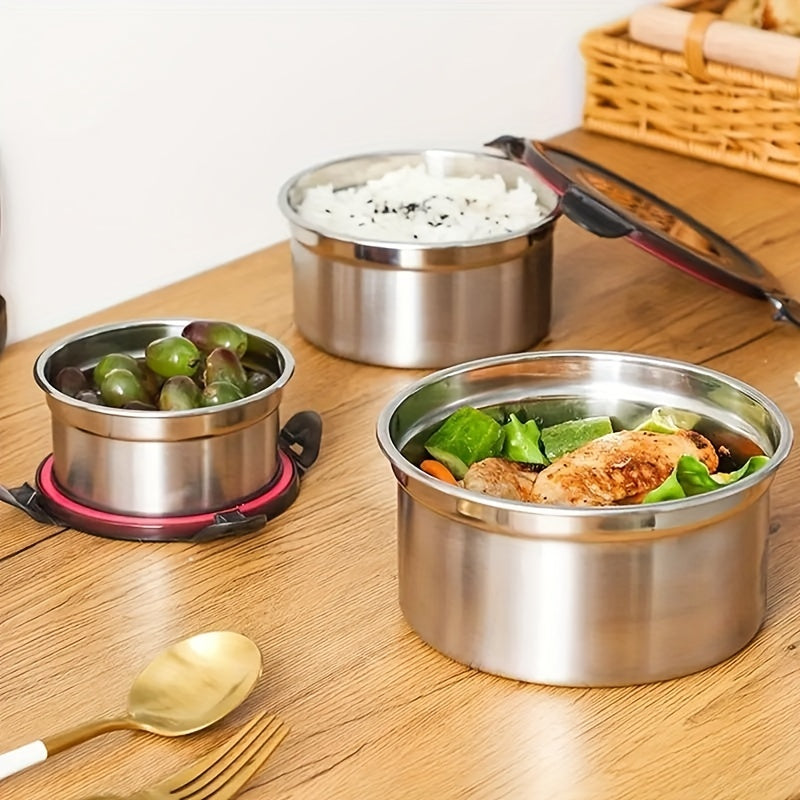 Three round stainless steel food storage containers with black leakproof clip-on lids — view 4