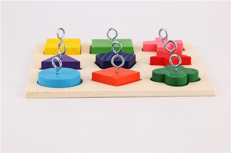 9-piece colorful wooden block parrot training toy on a square wooden platter base — view 5