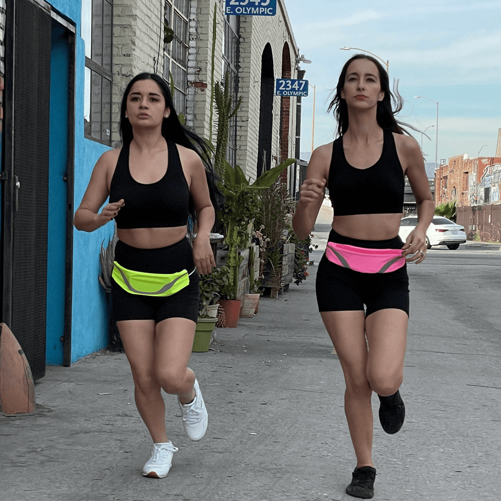 Water-resistant sport waist pack running belt with reflective strip and zipper pocket
