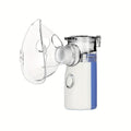 Portable facial steamer and humidifier in blue, featuring compact design and USB charging capability.
