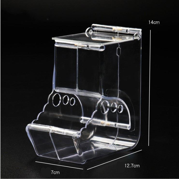 Transparent plastic hamster feeder food box attached securely to small pet cage wire — view 2