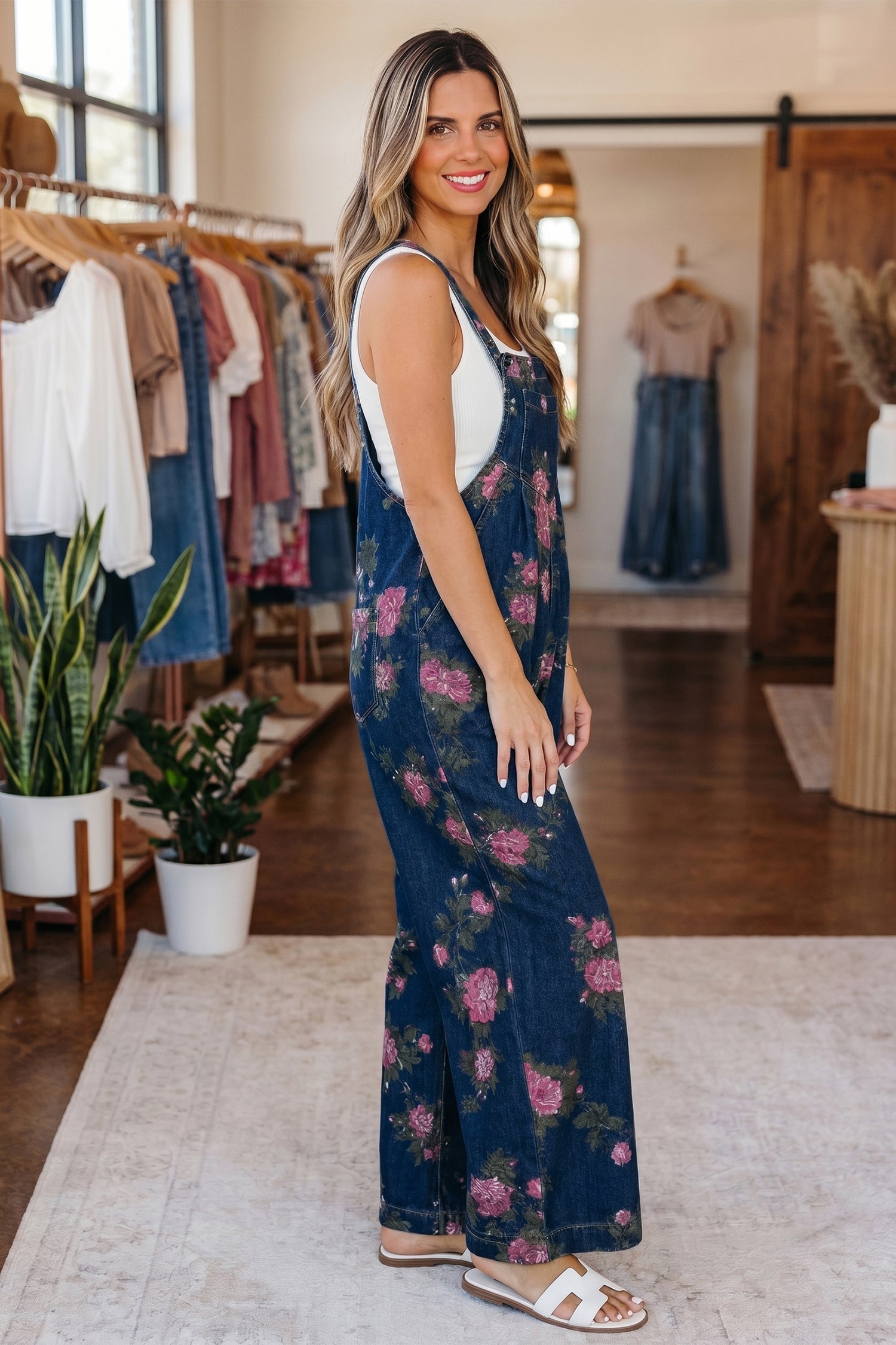 Akira waist wide leg jumpsuit in blue vintage washed denim with adjustable buttoned shoulder straps — view 2