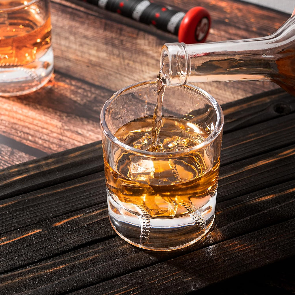 Clear 12oz baseball whiskey glass with a sculpted floating baseball design in the bottom base — view 3