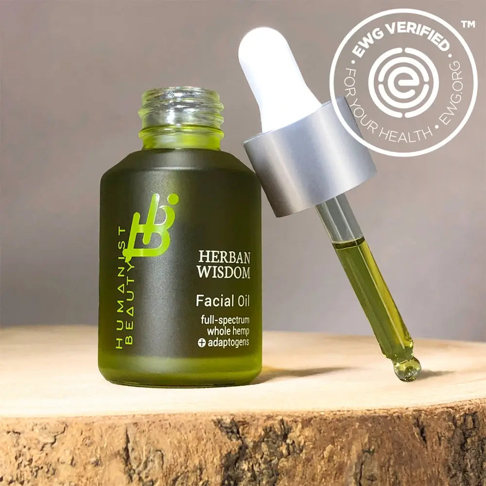 Herban Wisdom facial oil in glass dropper bottle with natural botanical serum for calm glowing skin