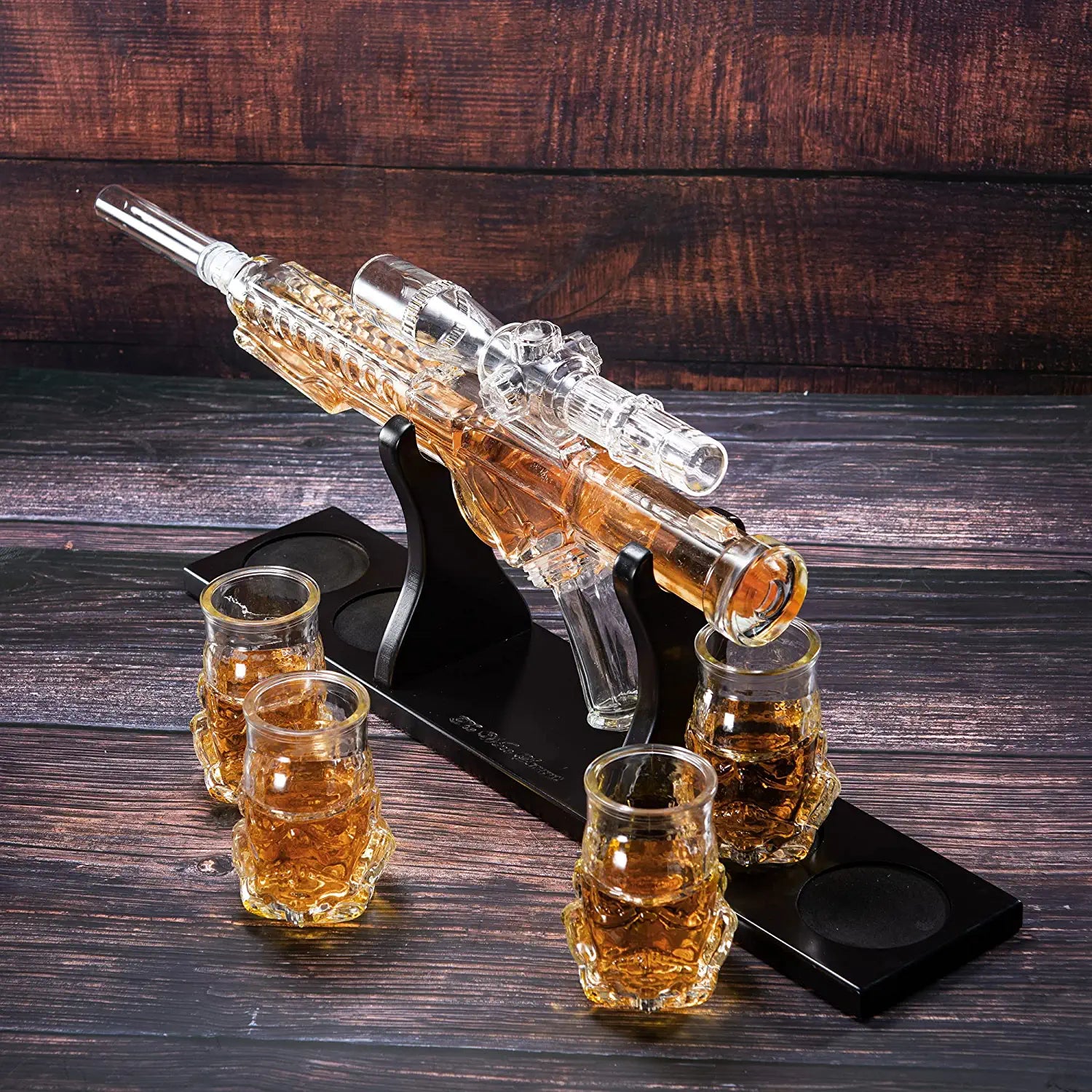 Glass blaster force gun whiskey decanter set with four glasses on a mahogany wood display base — view 3
