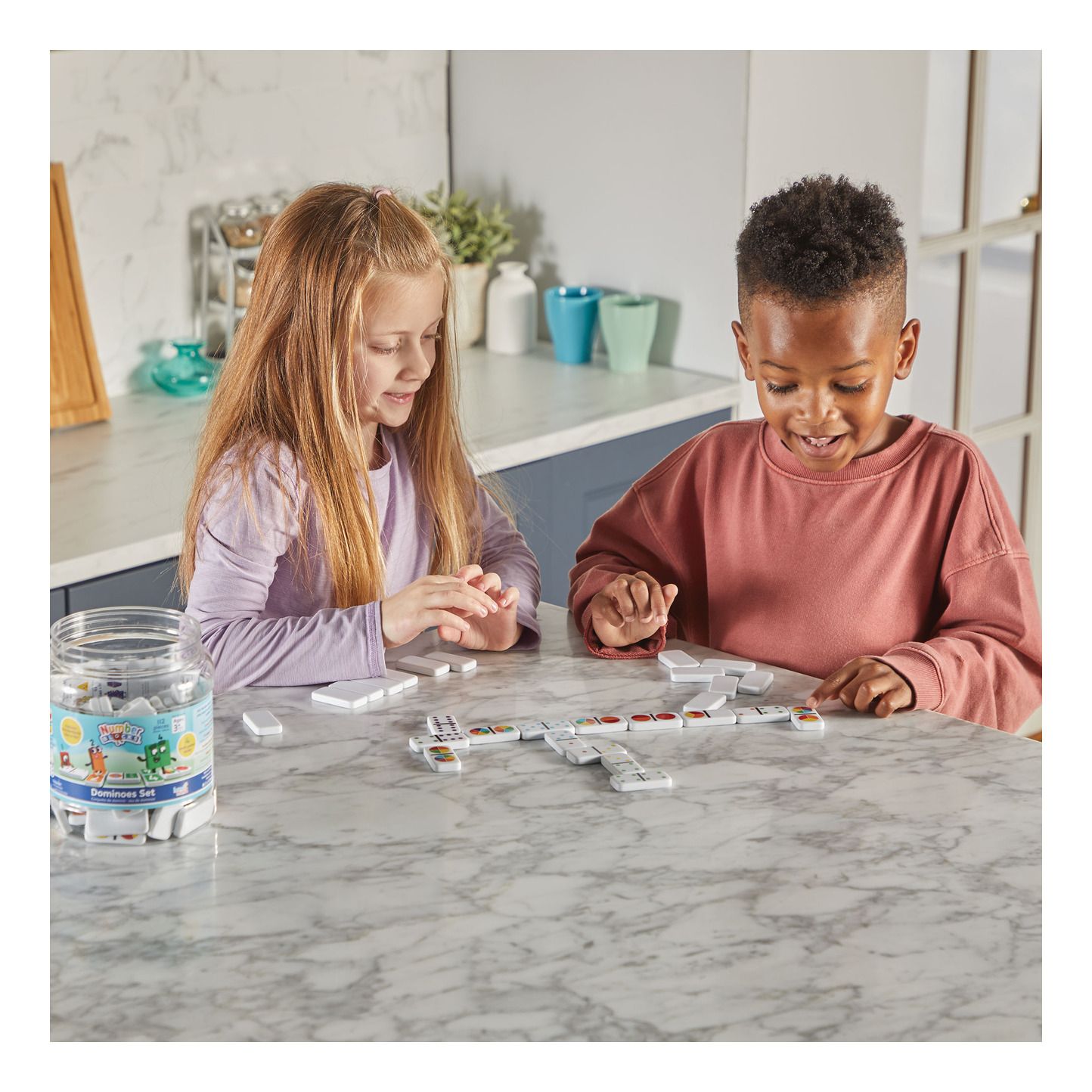 Colourful Numberblocks educational dominoes set for kids showing numbers and characters with storage tub — view 3
