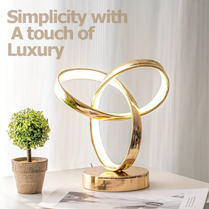Golden space-themed USB bedside table lamp with polished metal base and soft glowing shade — view 2