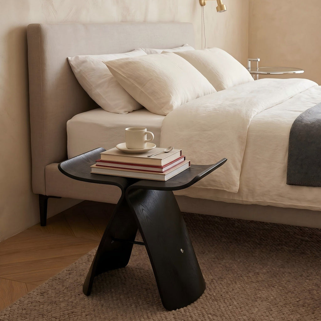 Sculptural wooden accent chair and multifunctional stool with a modern curved silhouette and natural grain finish — view 4