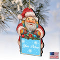 Wooden Santa and snowman Christmas picture frame ornament displaying a small photograph, crafted from birch.