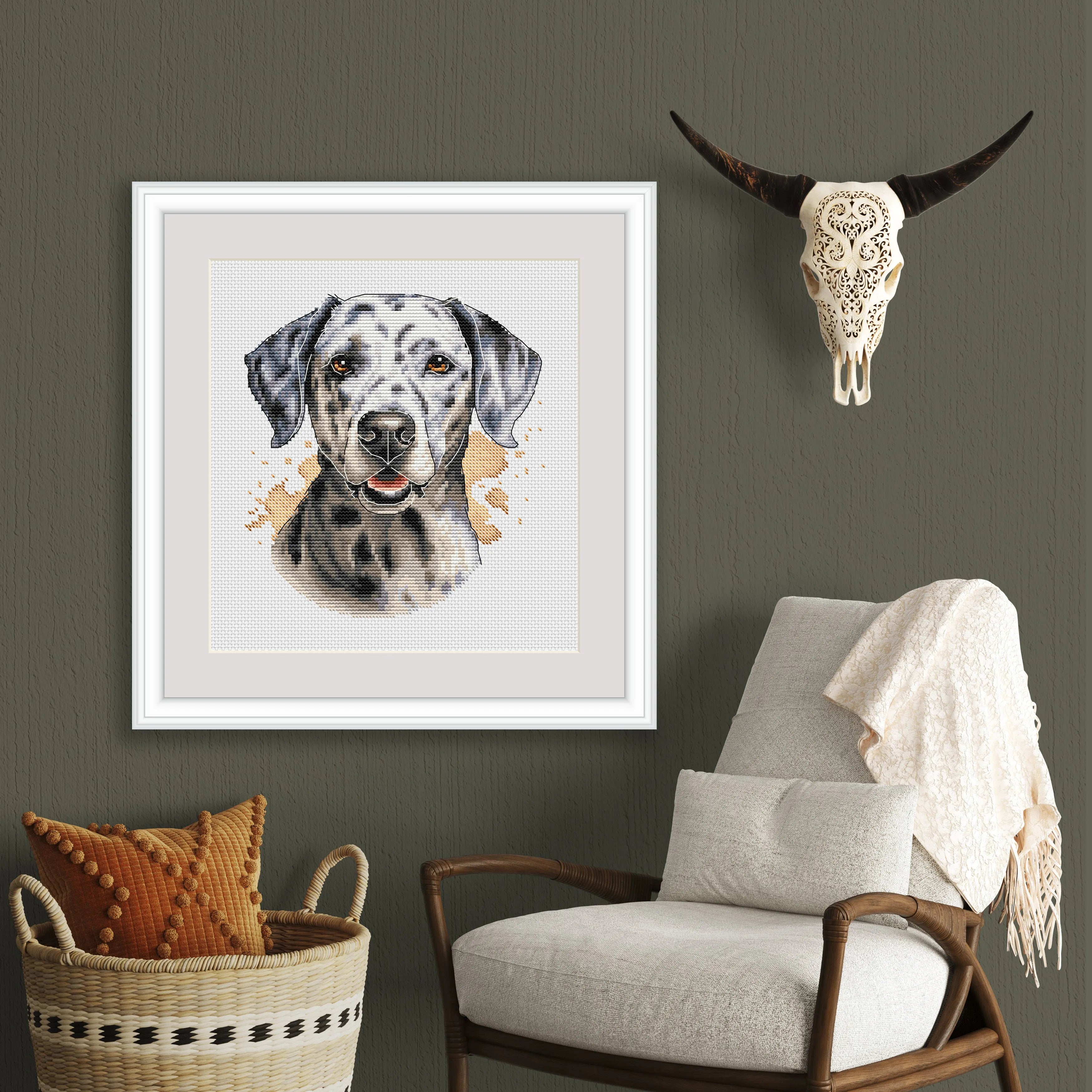 Finished Dalmatian dog cross stitch portrait pattern showing a white dog with black spots