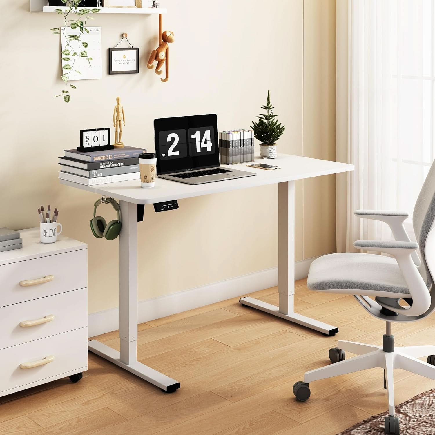 White electric adjustable height standing desk with solid steel frame and spacious 40x24 desktop. — view 2