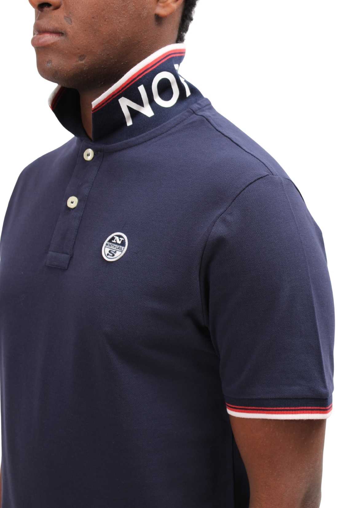 Men's navy blue cotton mesh polo shirt with contrasting piping and front logo patch. — view 56