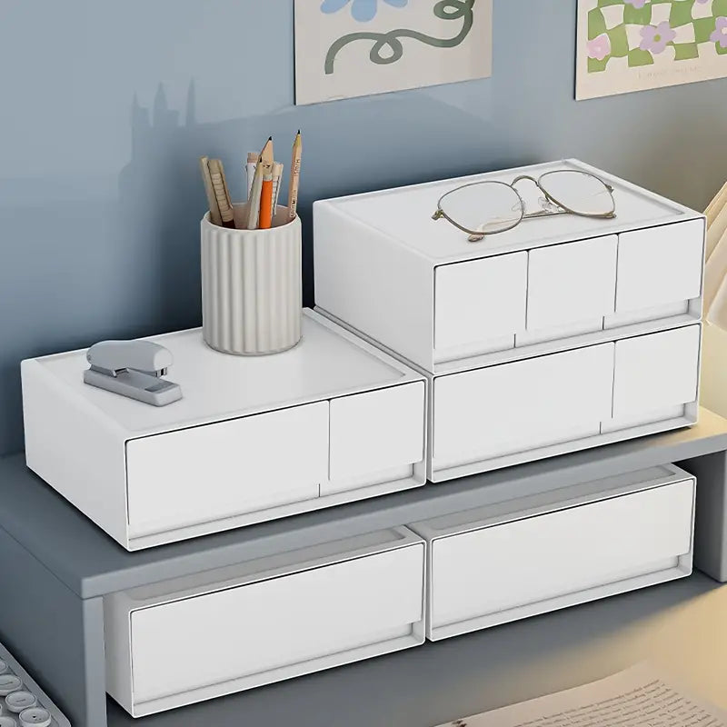 Stackable white plastic bedside drawer organizer with multiple storage layers for bedroom essentials — view 2