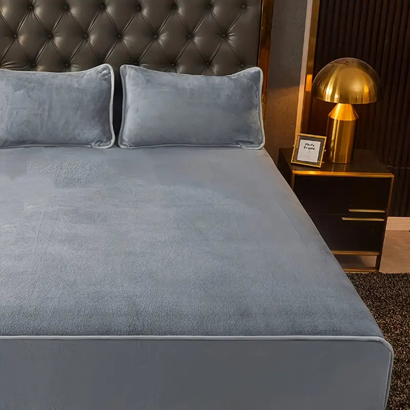Solid grey milk fleece queen fitted sheet tightly secured on a mattress for comfortable sleeping — view 3