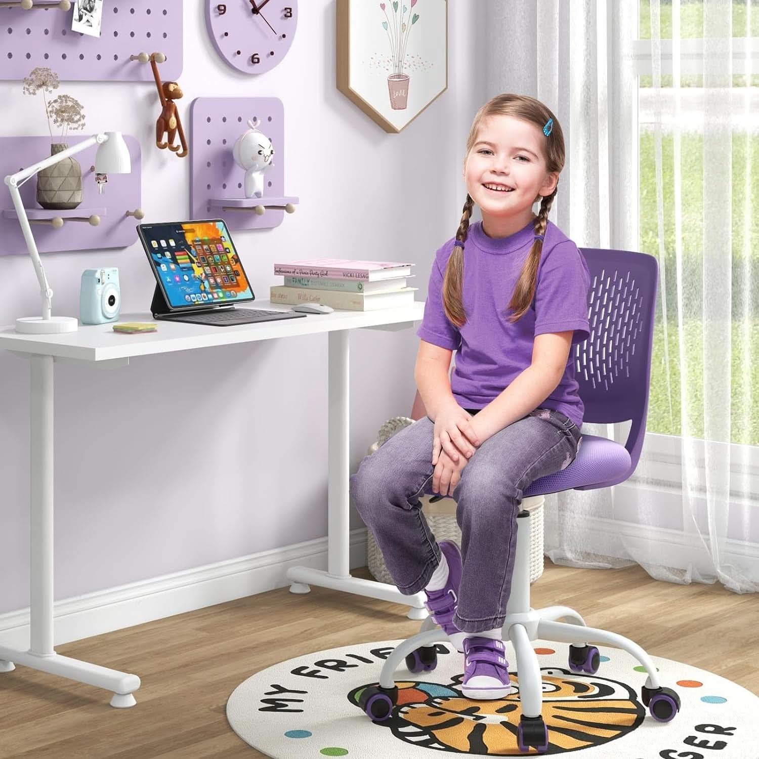 Bright purple kids desk chair with ergonomic backrest, adjustable height, and five-wheel base. — view 2
